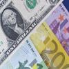 اليورو يقترب من التساوي مع الدولار ..  الأسباب والتداعيات 